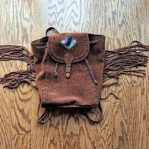 Brown leather fringe packpack